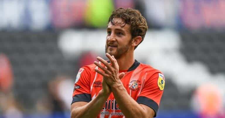 Photo: Luton’s Tom Lockyer celebrates promotion from hospital bed