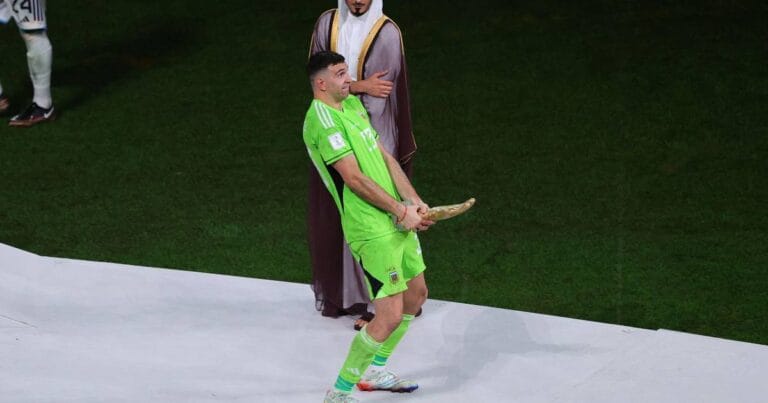 Emiliano Martinez explains reason behind odd gesture with golden glove trophy