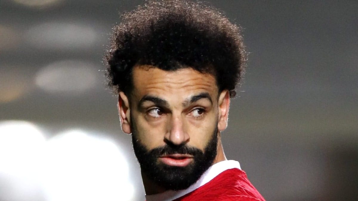 Salah penalty sends Reds top of table above Man City
