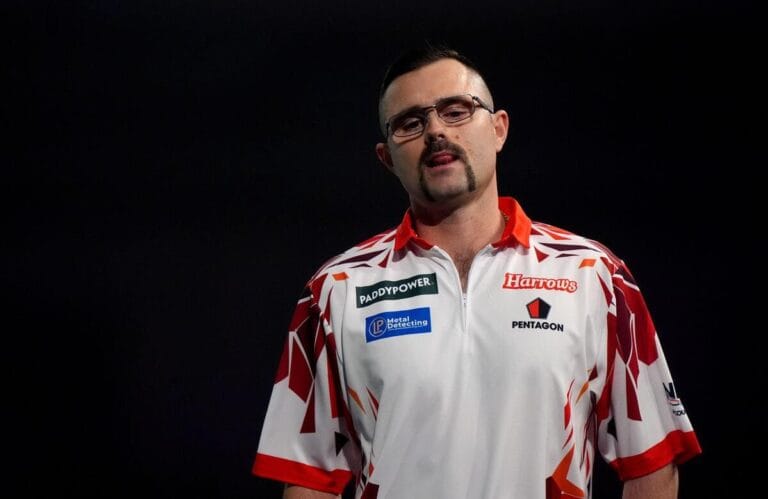 World Darts Championship: Heta hits nine-darter but is knocked out