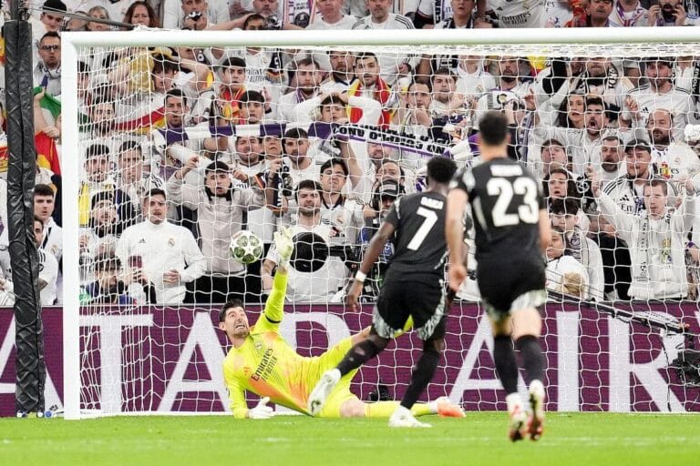 Saka sees penalty saved but Arsenal keep Real remontada at bay