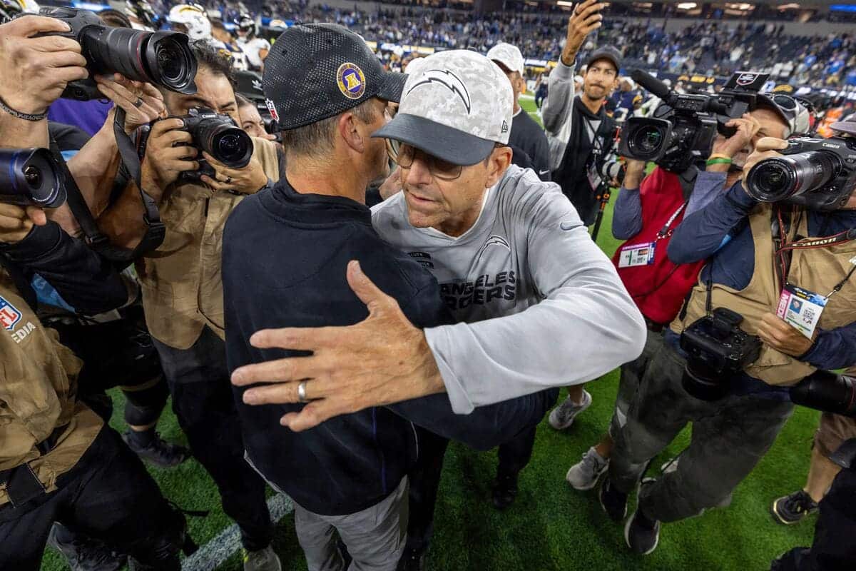 Lamar Jackson stars as John wins HarBowl over brother Jim