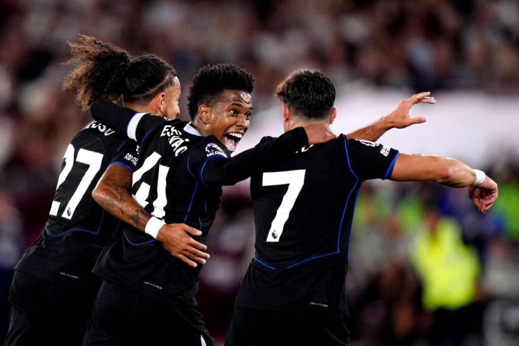 Estevao (middle) celebrates for Chelsea