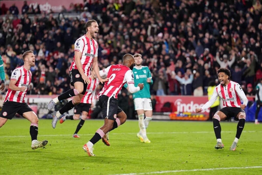 Brentford celebrate a goal against Liverpool
