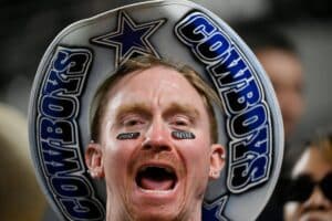 Cowboys keep season alive with Raiders win