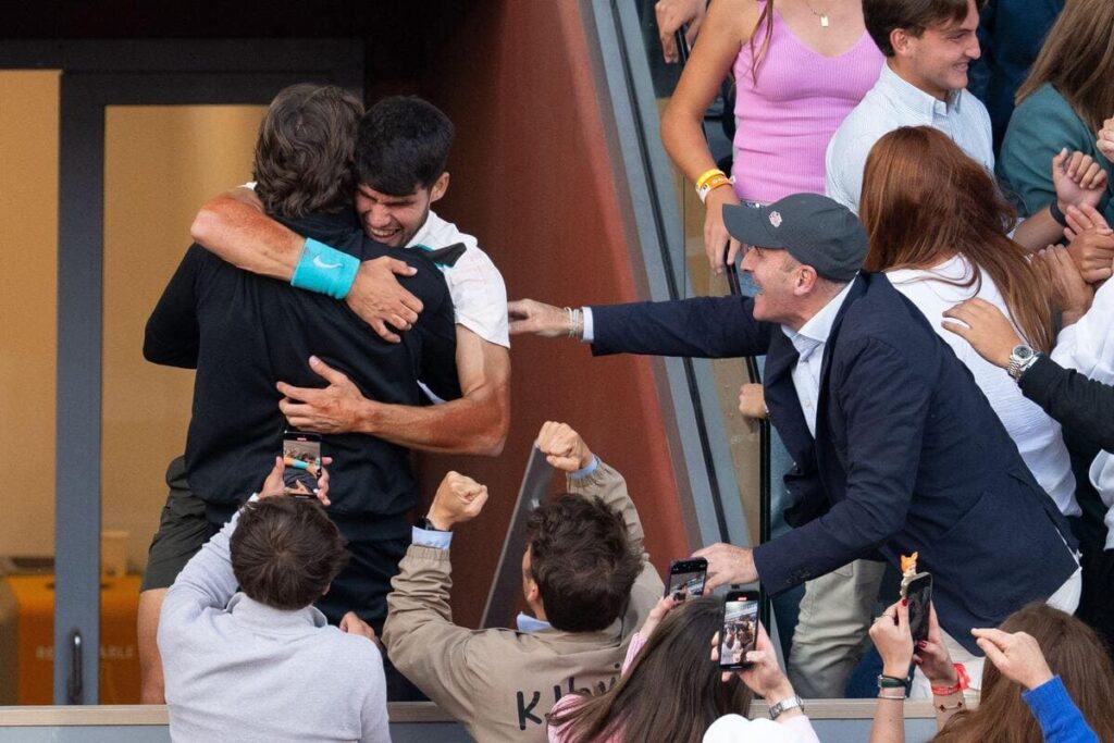 Carlos Alcaraz celebrates winning the French Open.