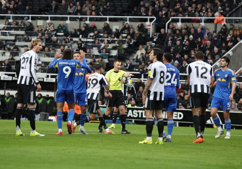 Michael Salisbury gives Leeds a penalty against Newcastle.