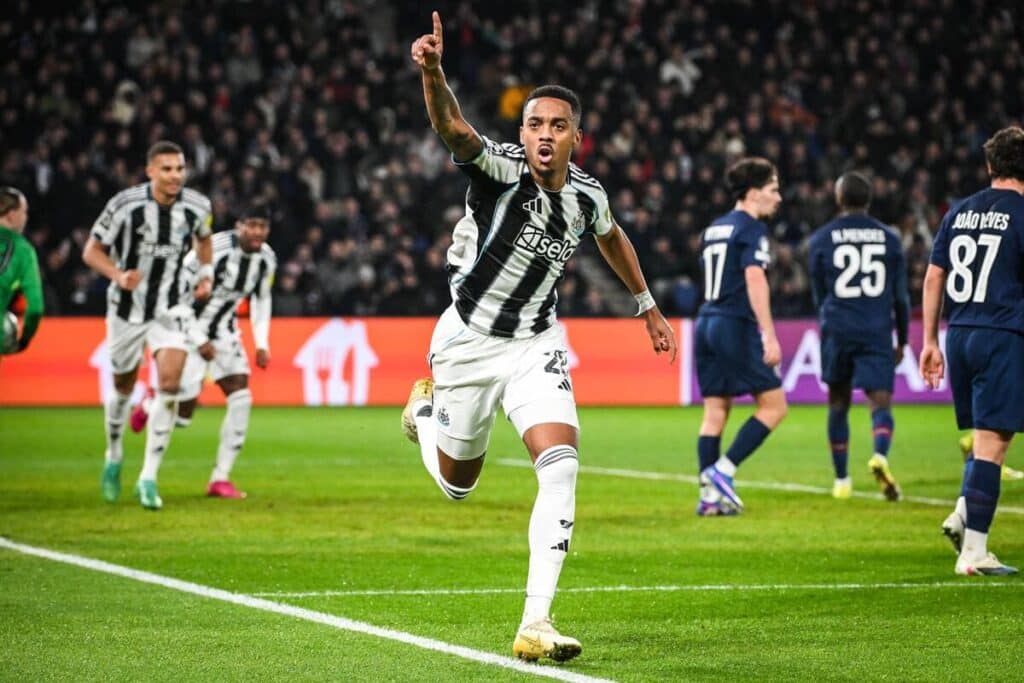 Joe Willock celebrates his goal for Newcastle against PSG