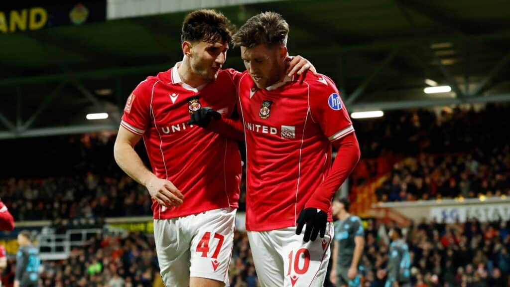 Wrexham's Josh Windass celebrates scoring against Ipswich Town