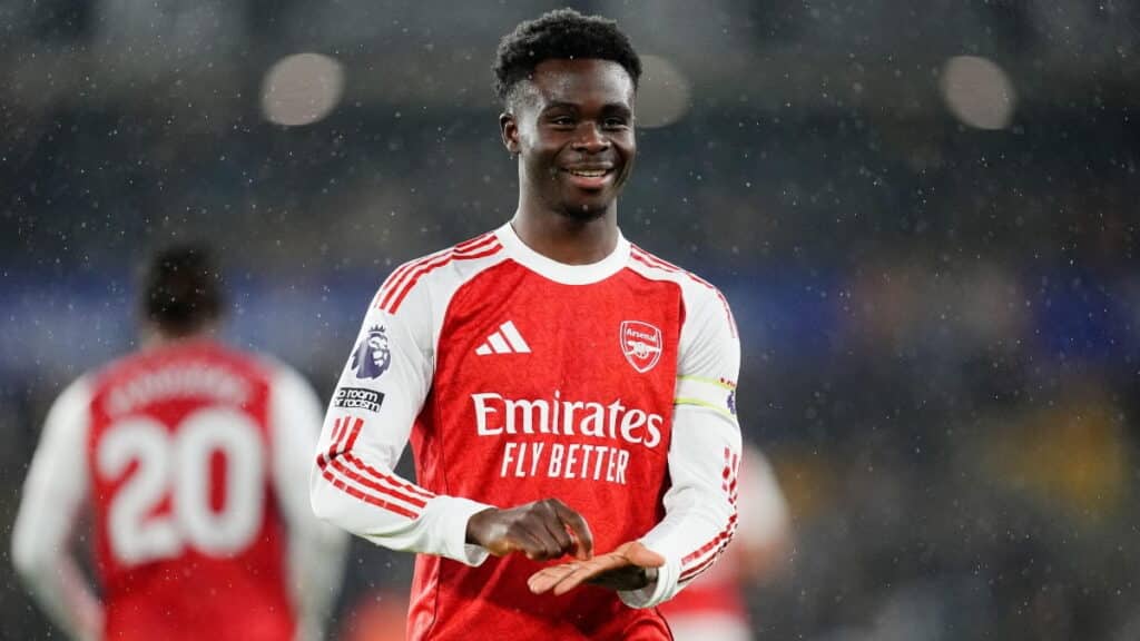Arsenal winger Bukayo Saka celebrates scoring against Wolves