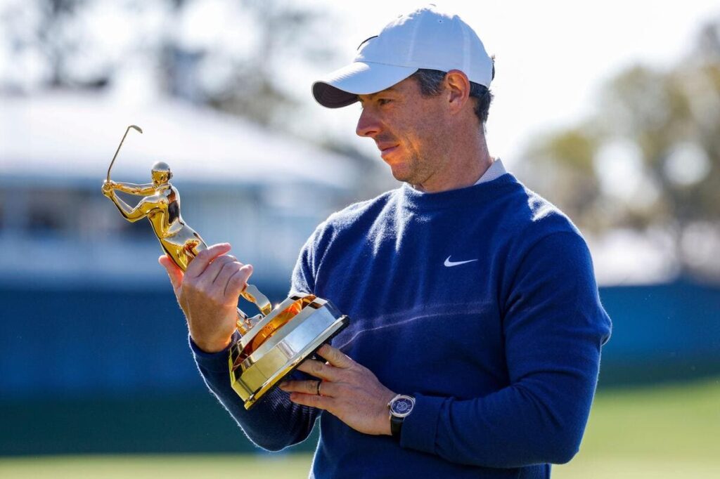 Rory McIlroy with the Players Championship trophy.