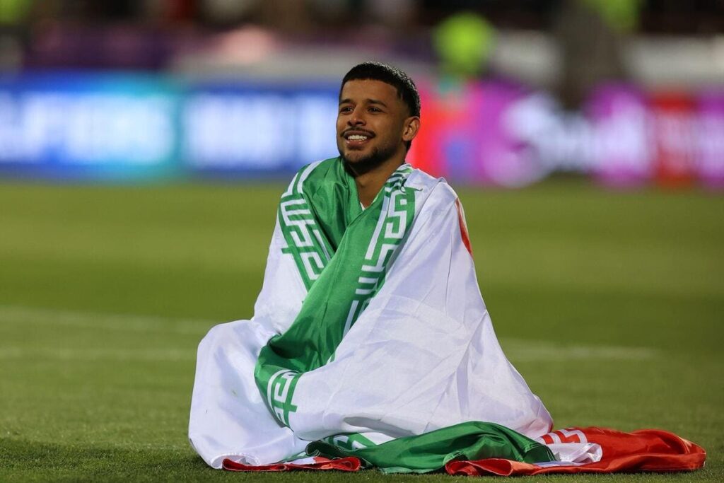 Iran's Mehdi Ghayedi celebrates the country qualifying for the 2026 World Cup