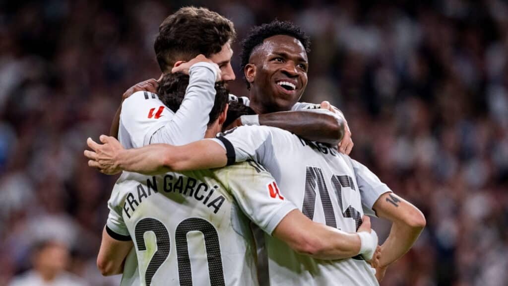 Real Madrid players celebrate scoring against Elche