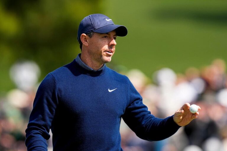 Masters 2026: McIlroy in share of lead after superb start to title defence