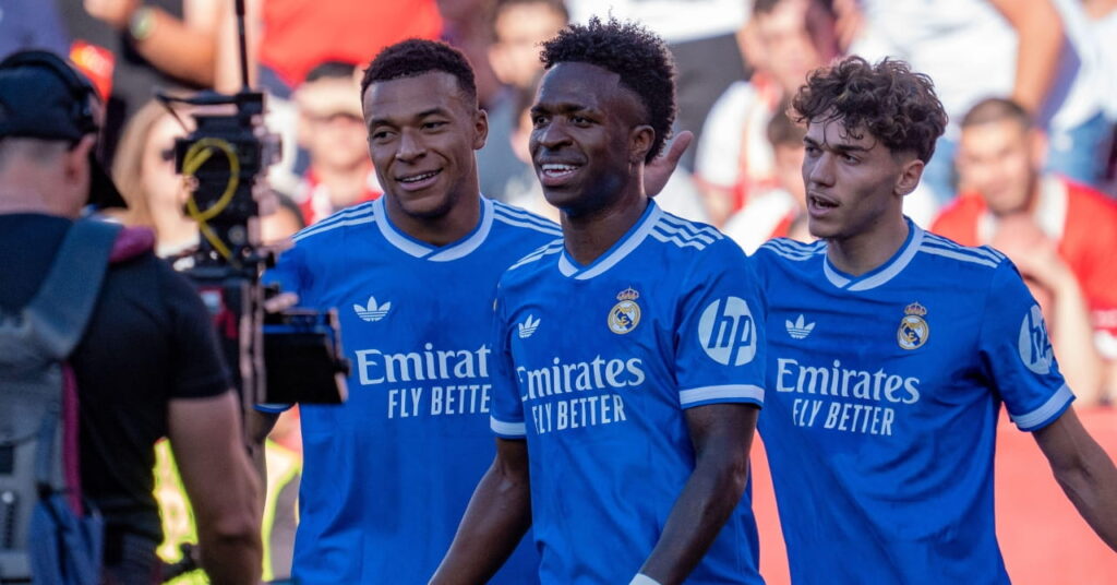 Real Madrid celebrate scoring against Sevilla