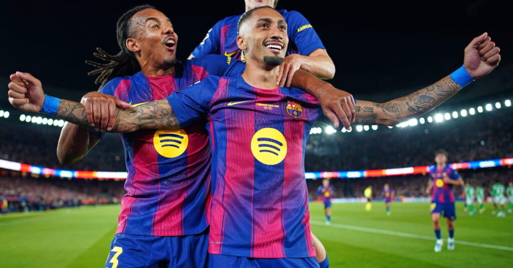 Raphinha celebrates scoring for Barcelona