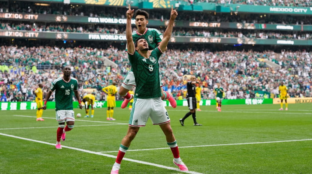 Raul Jimenez celebrates scoring for mexico