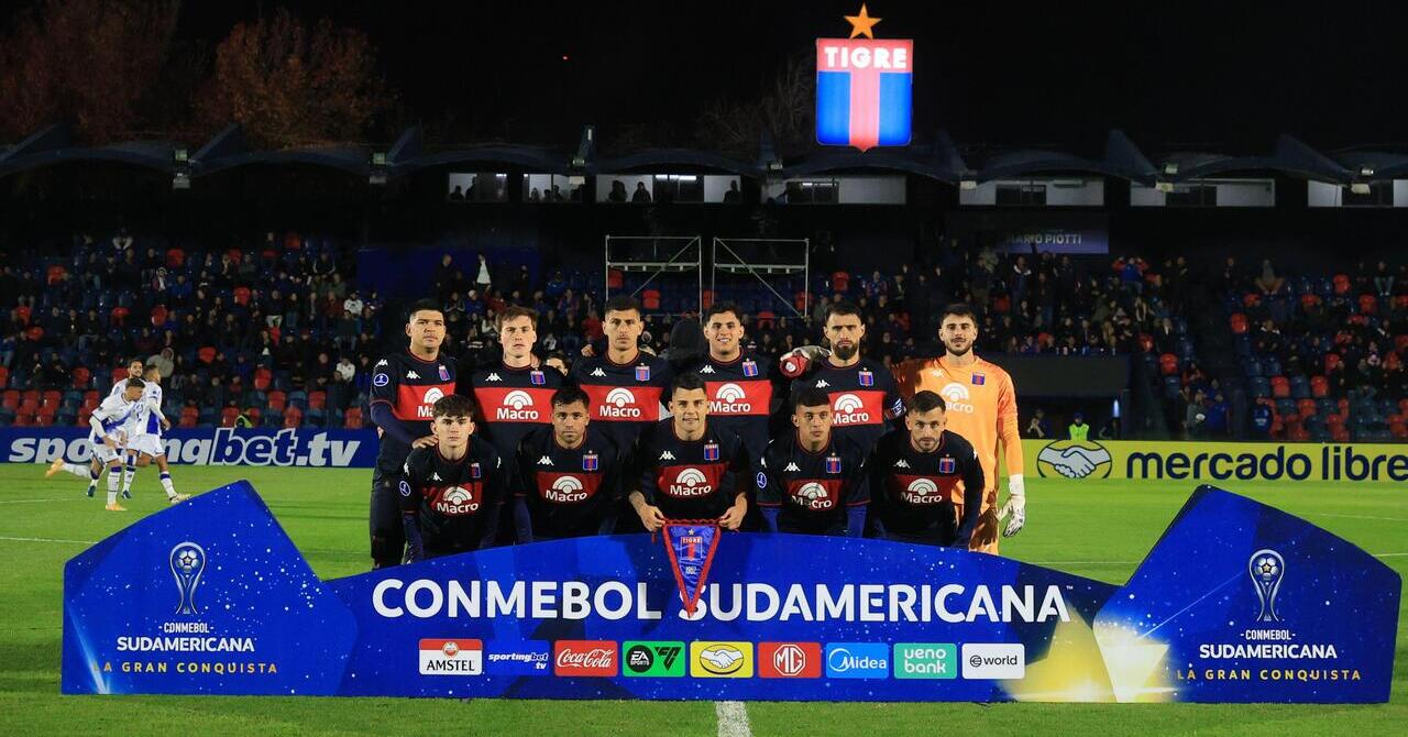 Players from Argentine club Tigre display Malvinas flag after Copa Sudamericana win