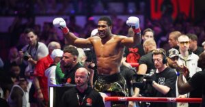 ‘It hurts to even talk about it’: Joshua dedicates chaotic win over Prenga to late team-mates as Fury bout remains on course