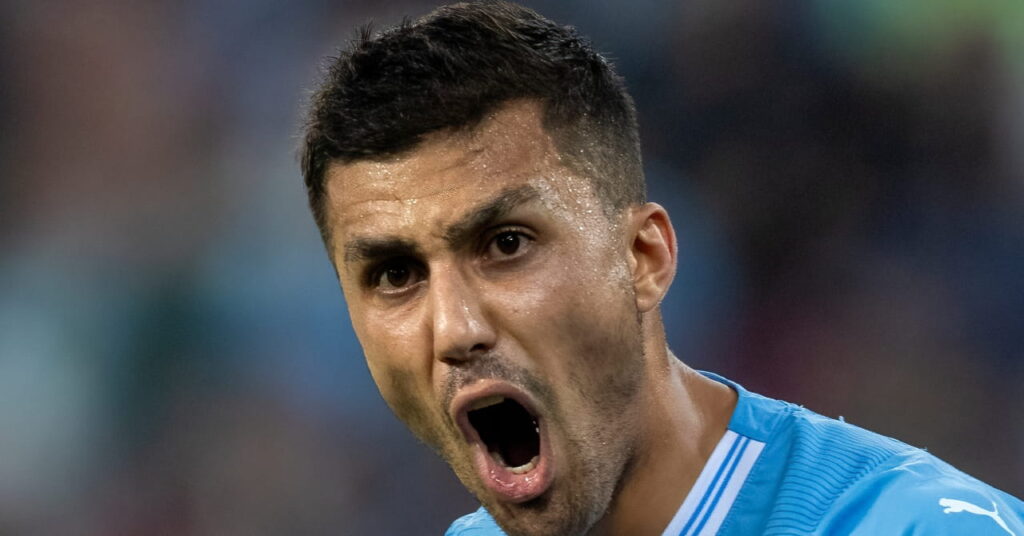 Spain footballer Rodri roaring to celebrate a goal in a stadium while playing for Premier League team Manchester City Football Club