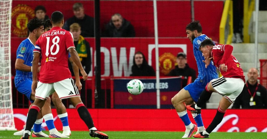 Manchester United's Shea Lacey scores