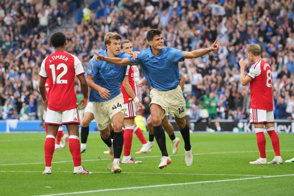 Brighton's Chema Andres, right and Luka Vuskovic celebrate after scoring